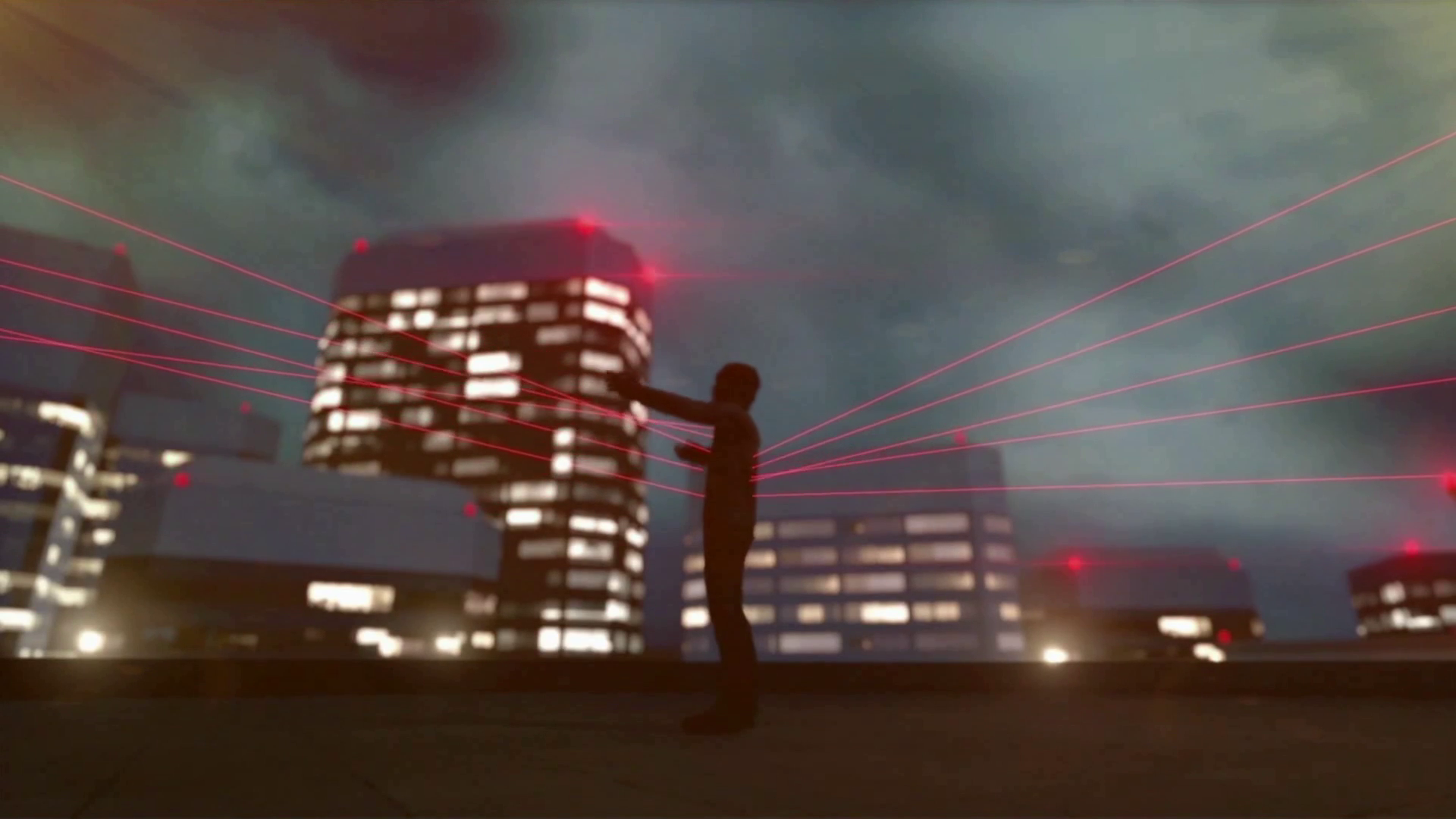 Screenshot from "LifeCut." On a Tokyo rooftop at night, Fujiwara raises his arms. Laser scopes from sniper rifles cover his torso from both in front and behind.